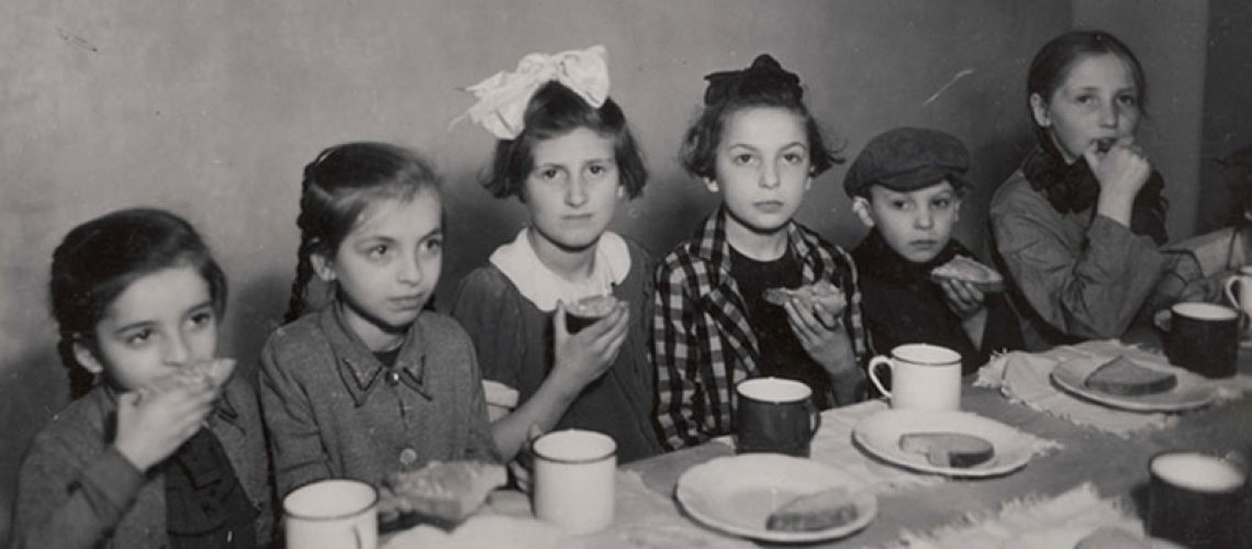 Warsaw, Poland, Girls eating in a Soup Kitchen in the Ghetto [Credit: www.yadvashem.org]